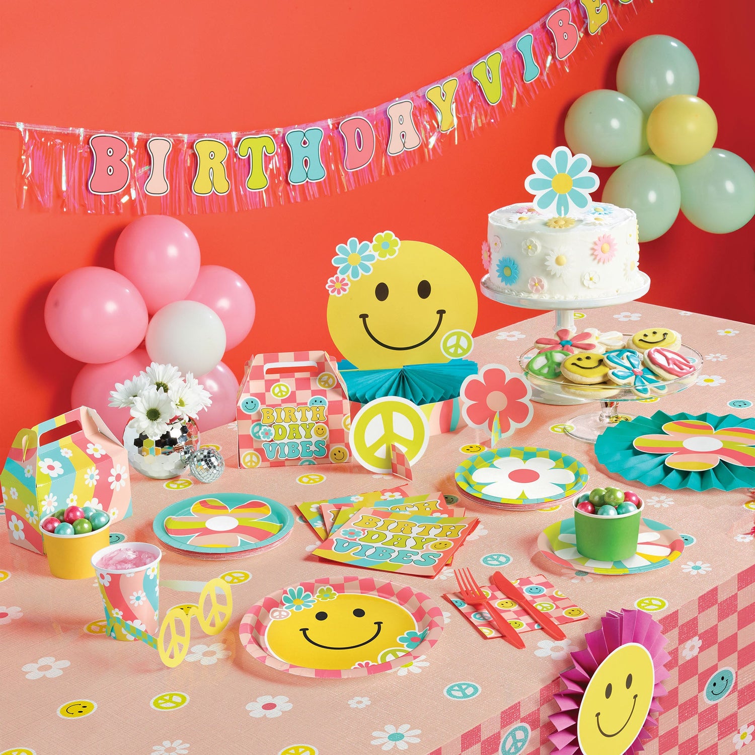 Flower Power Party Supplies displayed on a table