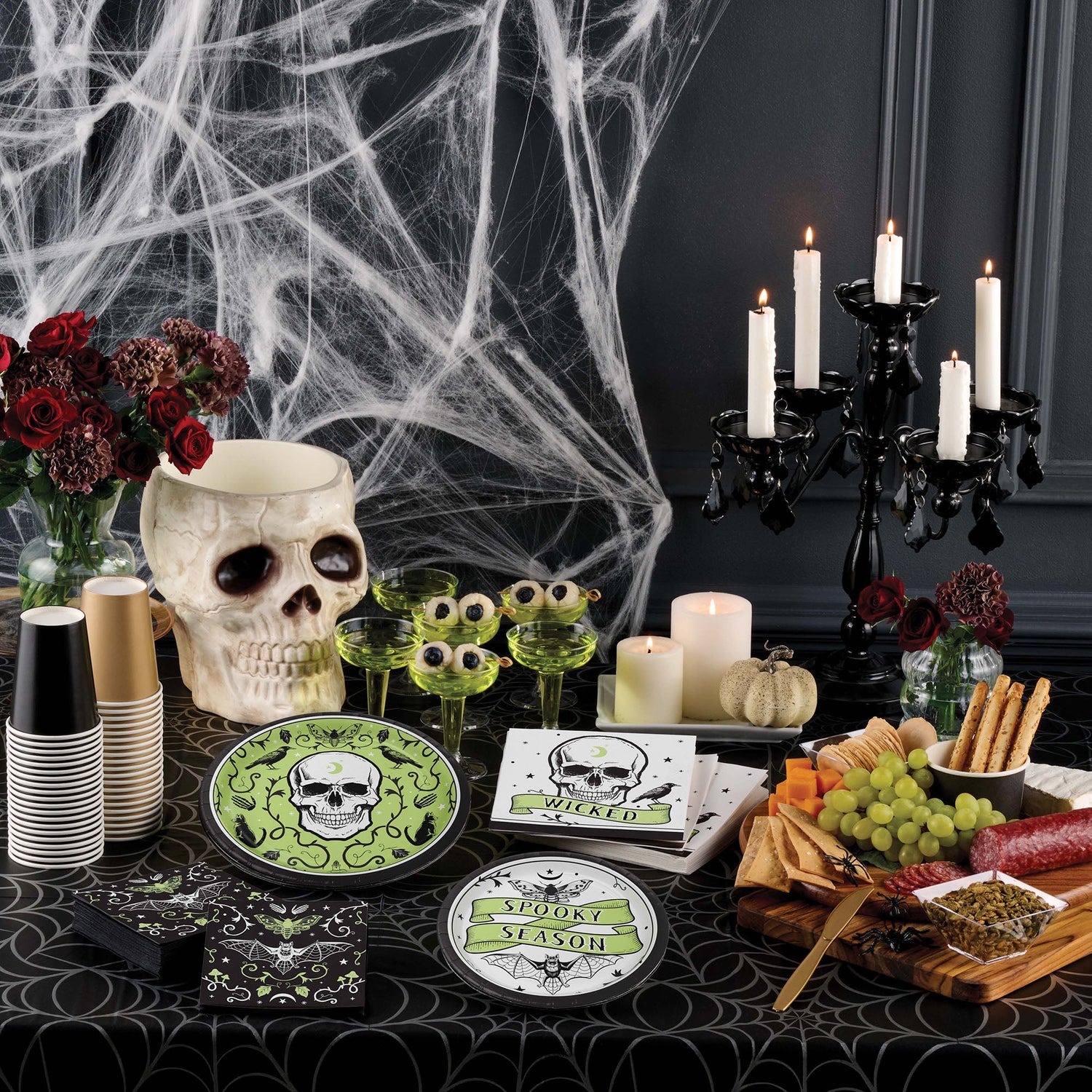 Spooky Season Party Supplies displayed on a table