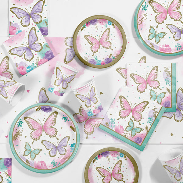 Golden Butterfly Party Supplies displayed on a table
