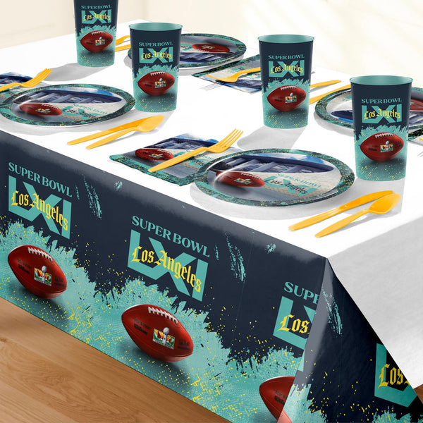 NFL Super Bowl LXI themed party table setting with a printed tablecloth, matching plates, cups, and utensils. 