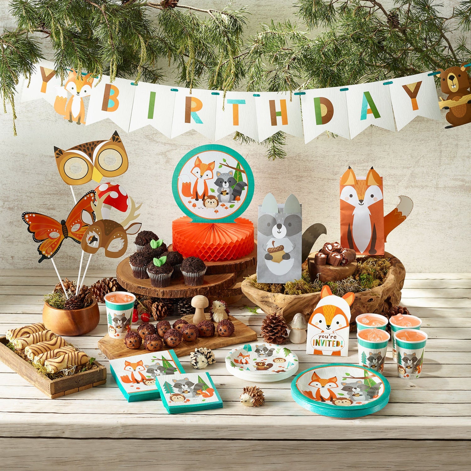 Wild One Woodland Animals Party Supplies displayed on a table
