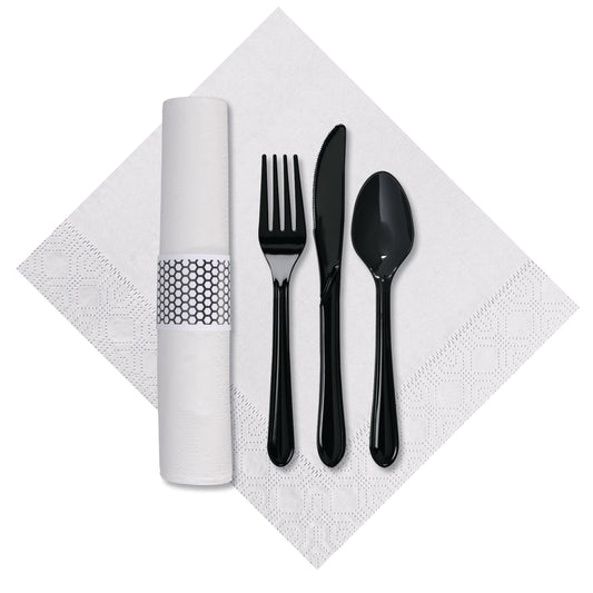 Black cutlery set on a white napkin with a white and black hexagon desig napkin holder.