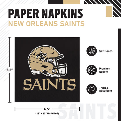 New Orleans Saints paper napkins shown on a white product graphic with dimensions and feature callouts. The napkin is black with a gold and white Saints helmet and large gold SAINTS text.