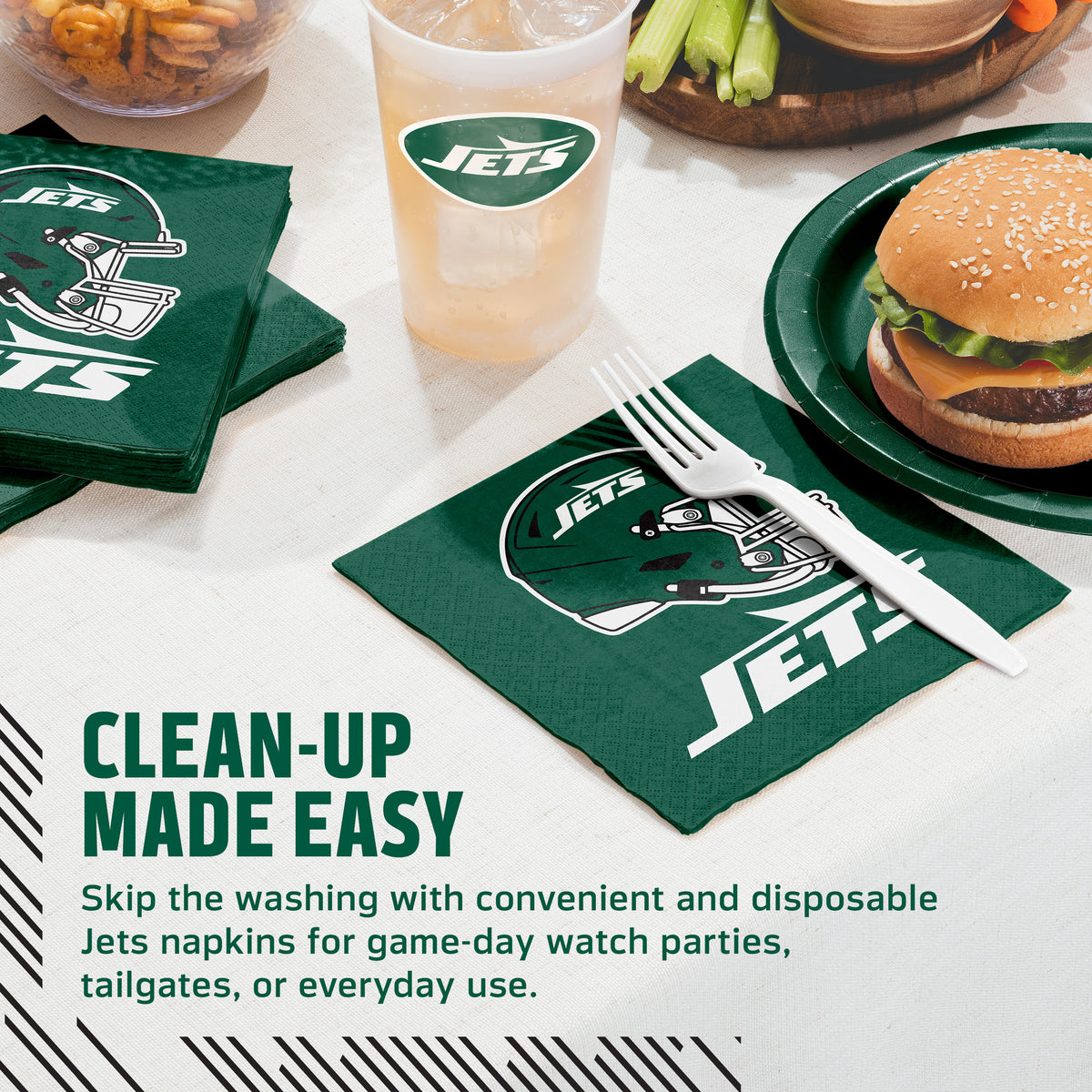 Green Jets-branded paper napkins with white logo graphics are shown on a table setting, alongside a matching drink cup, plate with a burger, fries, celery, and a fork resting on one napkin. Text on the image reads 'CLEAN-UP MADE EASY' and describes disposable Jets napkins for game-day or everyday use.