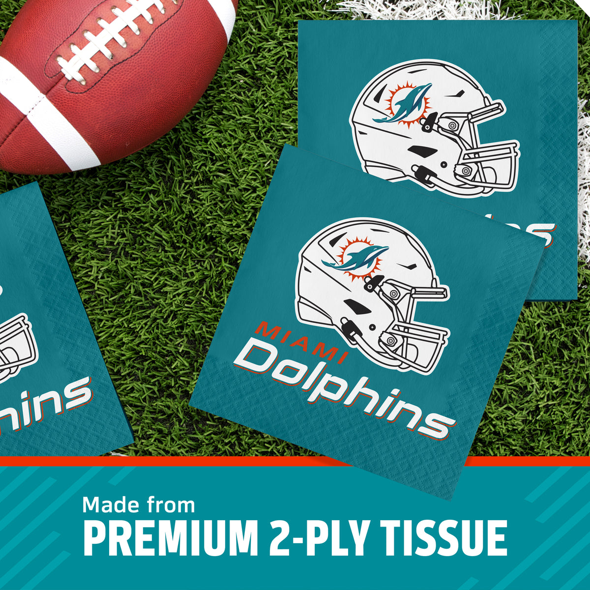 Miami Dolphins themed premium 2-ply tissue paper packs arranged on green turf with a football prop, plus a teal banner reading 'Made from PREMIUM 2-PLY TISSUE'.