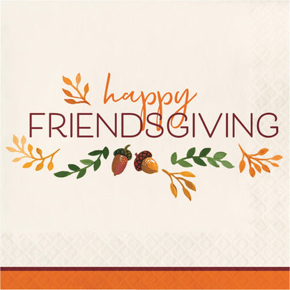 Fall Festivities Happy Friendsgiving Thanksgiving Luncheon Napkins 192 ct. Napkin with 'Happy Friendsgiving' text and fall-themed decorations on a white background