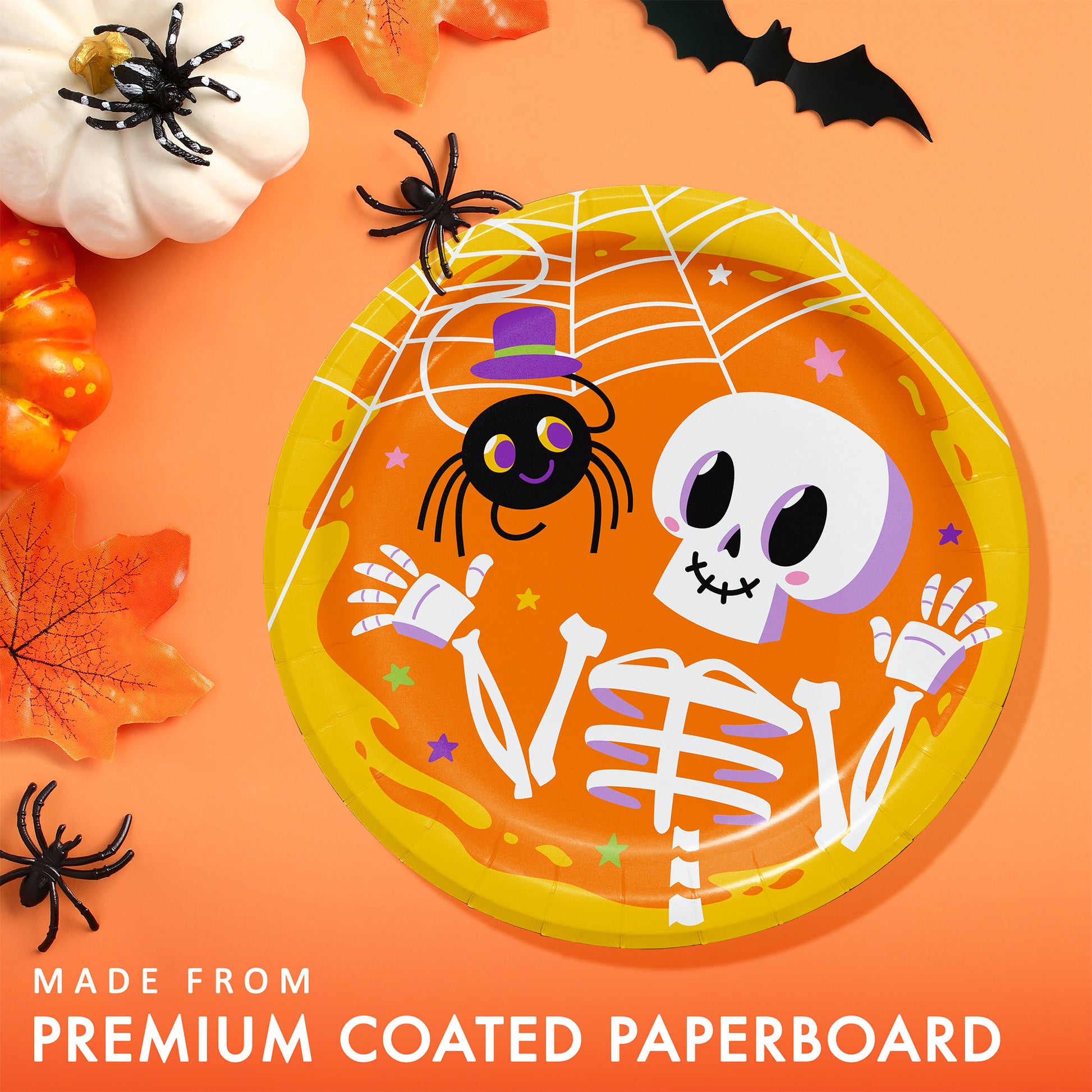 Glowing Ghouls Dessert Paper Plates 96 ct. Halloween-themed paper plate with spider and skeleton design on an orange background with decorations.