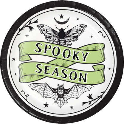 Spooky Season Dessert Paper Plates 96 ct. Circular design with 'Spooky Season' text, bat, and moth illustrations on a white background.