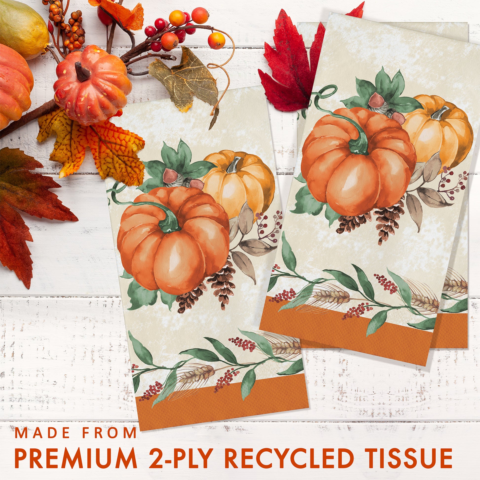 Harvest Delight Dinner Napkins 192 ct. Napkins with pumpkin and leaf design on a white wooden surface, with text about tissue quality.