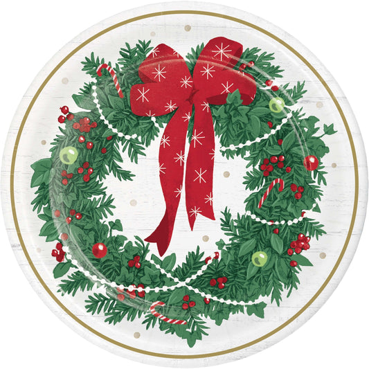 Christmas-themed paper plate with a wreath and red bow design.