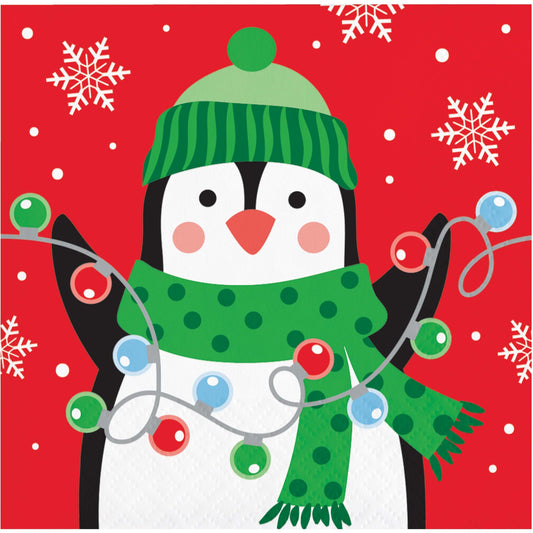 Christmas Cheer Beverage Napkins 192 ct. Paper napkin featuring a penguin wearing a green hat and scarf with Christmas lights on a red background with snowflakes