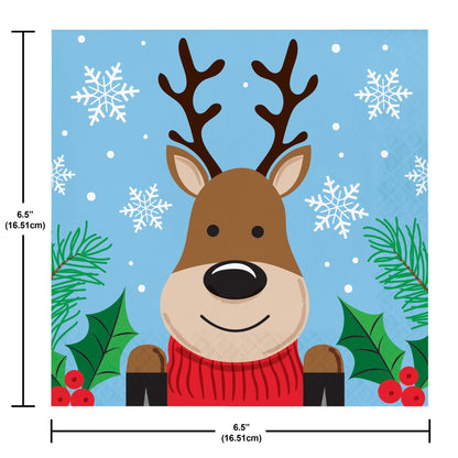 Christmas Cheer Luncheon Napkins 192 ct. Paper napkin featuring a cartoon reindeer with a red sweater on a blue background with snowflakes and greenery. Measurements shown.