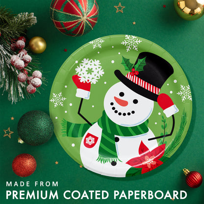 Christmas-themed paper plate with a snowman design on a green background with festive decorations.