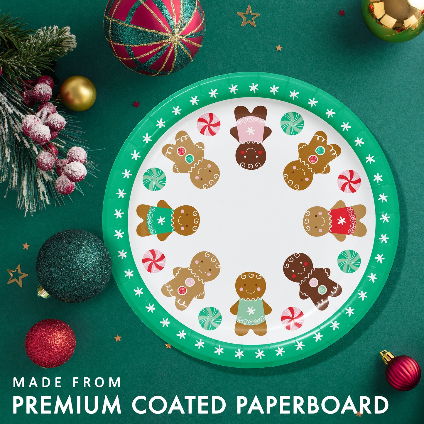 Christmas-themed plate with gingerbread design and peppermint candies. Plate shown surrounded by festive decorations on a green background.