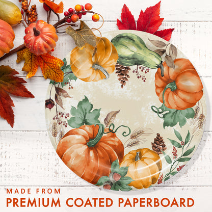Harvest Delight Dinner Paper Plates 96 ct. Decorative paper plate with pumpkins and leaves on a white wooden surface.