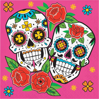 Skelebration Luncheon Napkins 192 ct. Colorful sugar skull design with flowers on a pink background