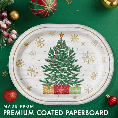 Decorative paper plate with a Christmas tree, presents and gold snowflakes on a white background. Plate shown on a green backgroun with festive decorations.
