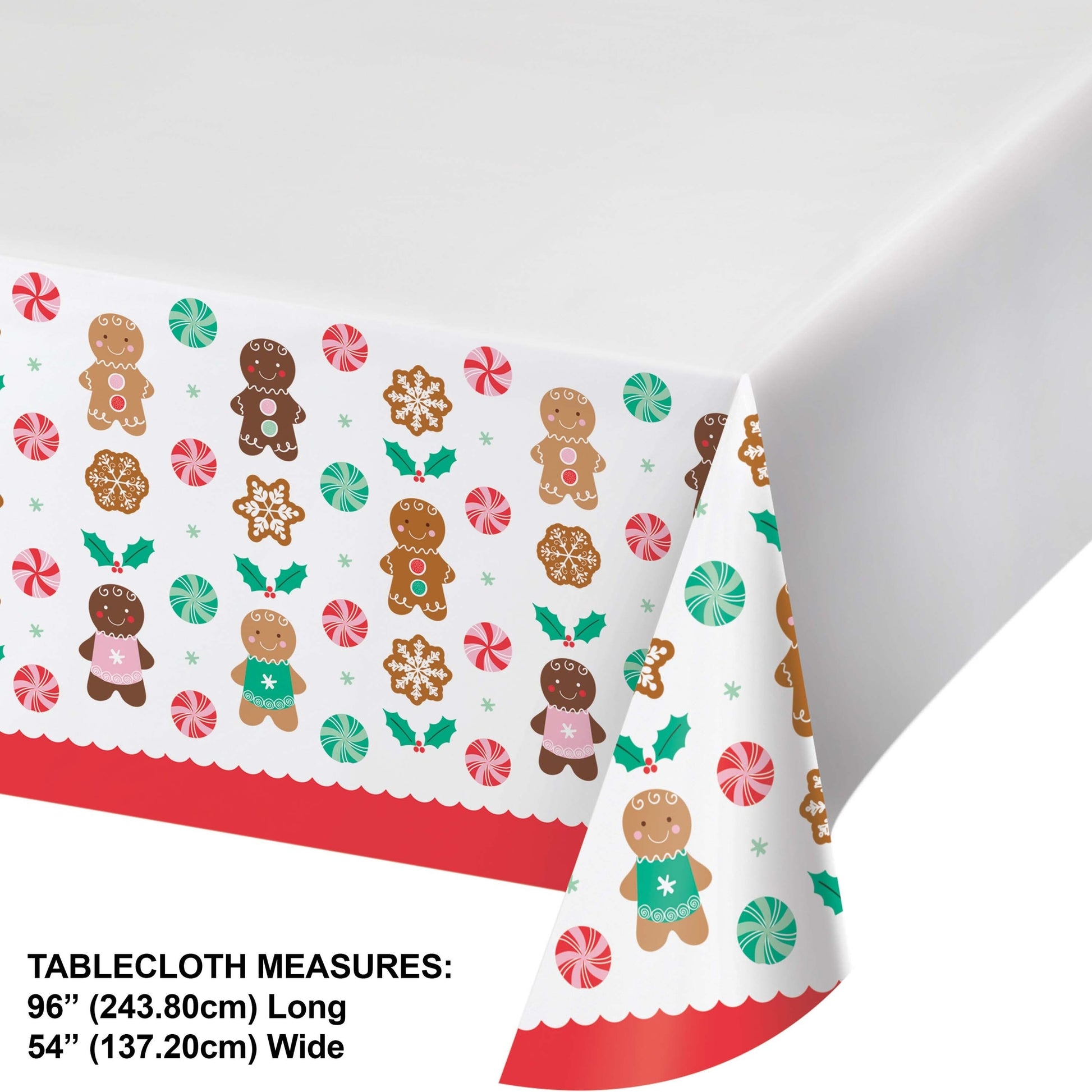Christmas-themed paper tablecloth with gingerbread men and candy patterns on a white background. Measurements shown.