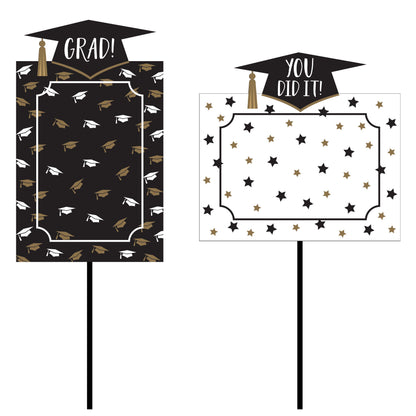 Two graduation-themed signs with decorative patterns on a white background