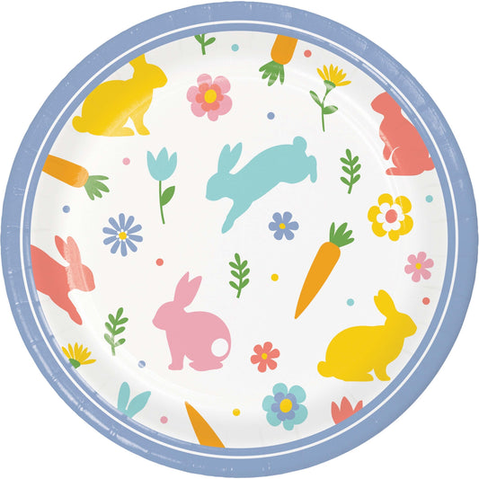 Round paper plate with Easter-themed design featuring bunnies, carrots, and flowers on a white background.