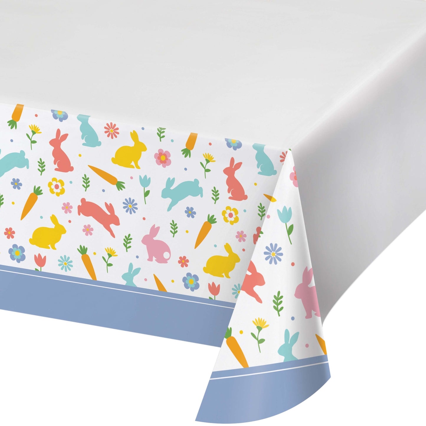 Colorful Easter-themed tablecloth with bunnies, carrots, and flowers on a white background.