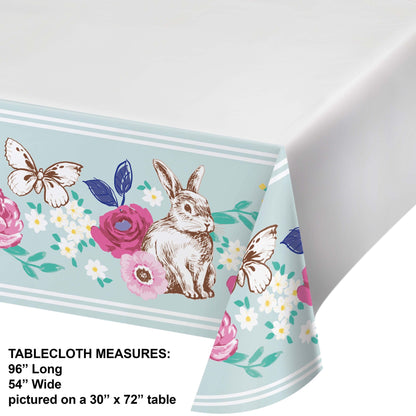 Tablecloth with rabbit and floral design on a white background. Measurements included.