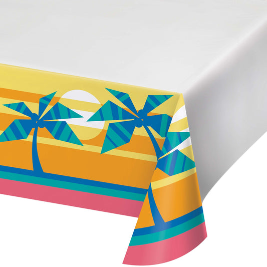 Colorful tablecloth with palm tree design on a white background