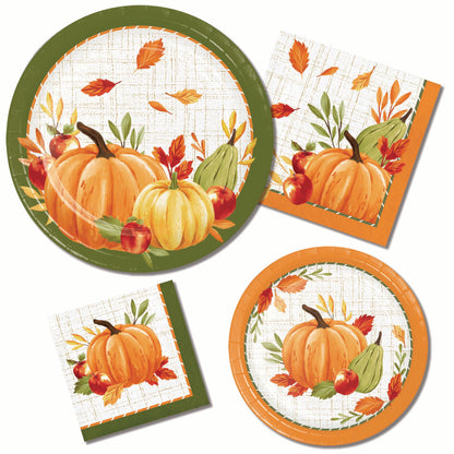 Fall harvest party tableware set including round paper plates and square paper napkins, all printed with orange pumpkins, red apples, green gourd, and autumn leaves on a white textured background.