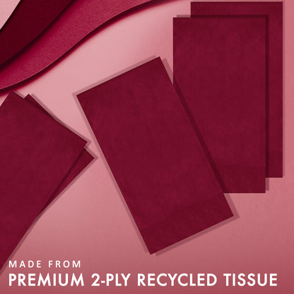 Red napkins on a pink background with text about premium 2-ply recycled tissue.