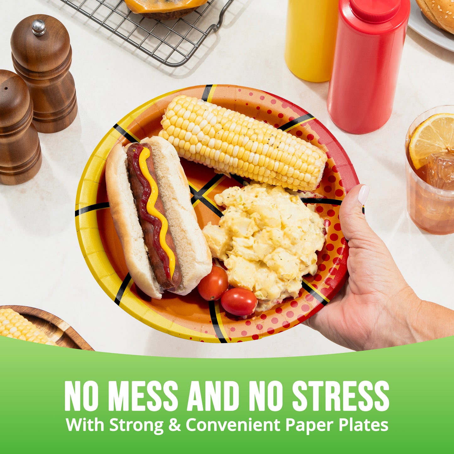 Colorful paper plate with hot dog, corn on the cob, and mashed potatoes with text 'No Mess and No Stress'.