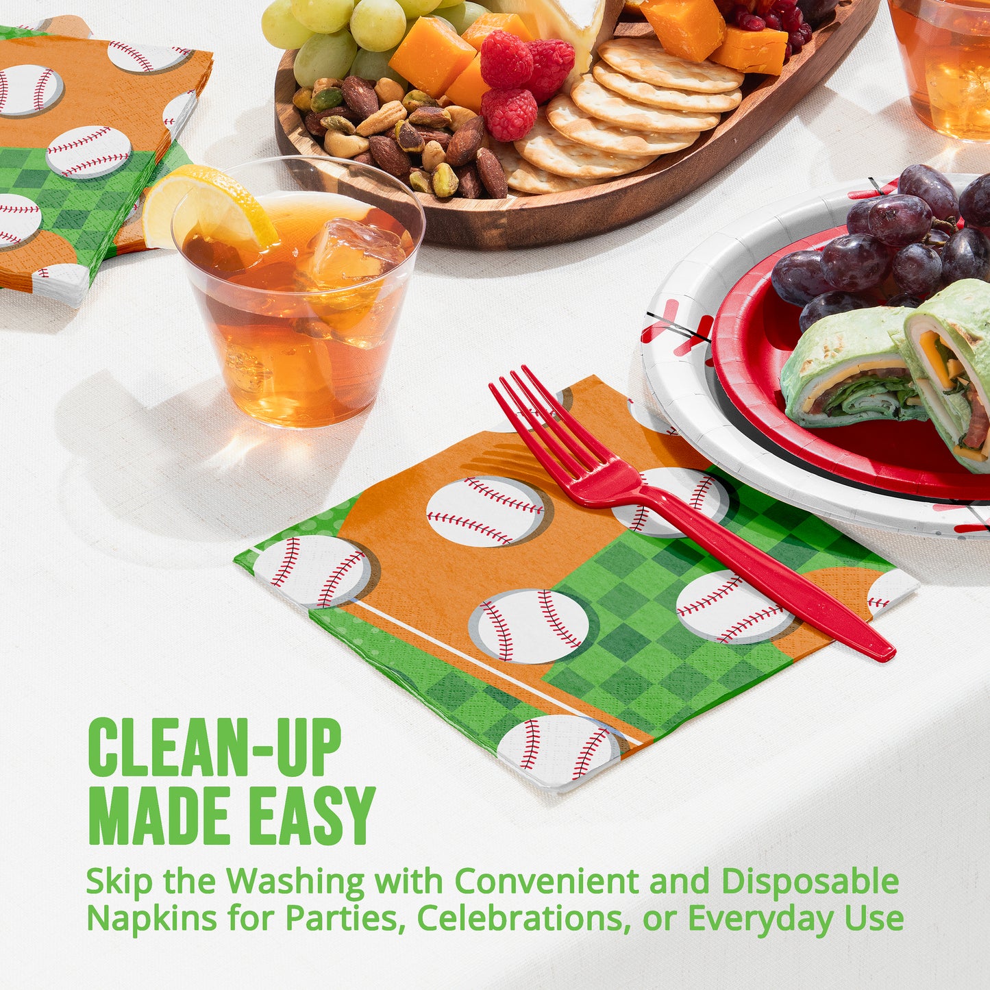 Disposable napkins with baseball design on a table with food and drinks.