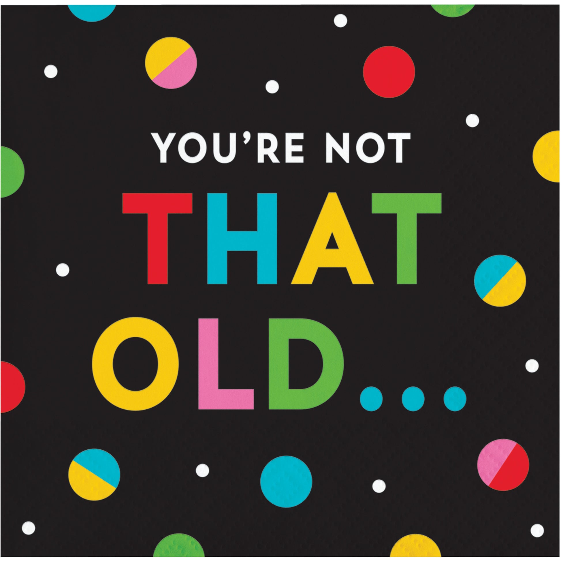 Napkin with colorful text 'YOU'RE NOT THAT OLD...' on a black background with polka dots.