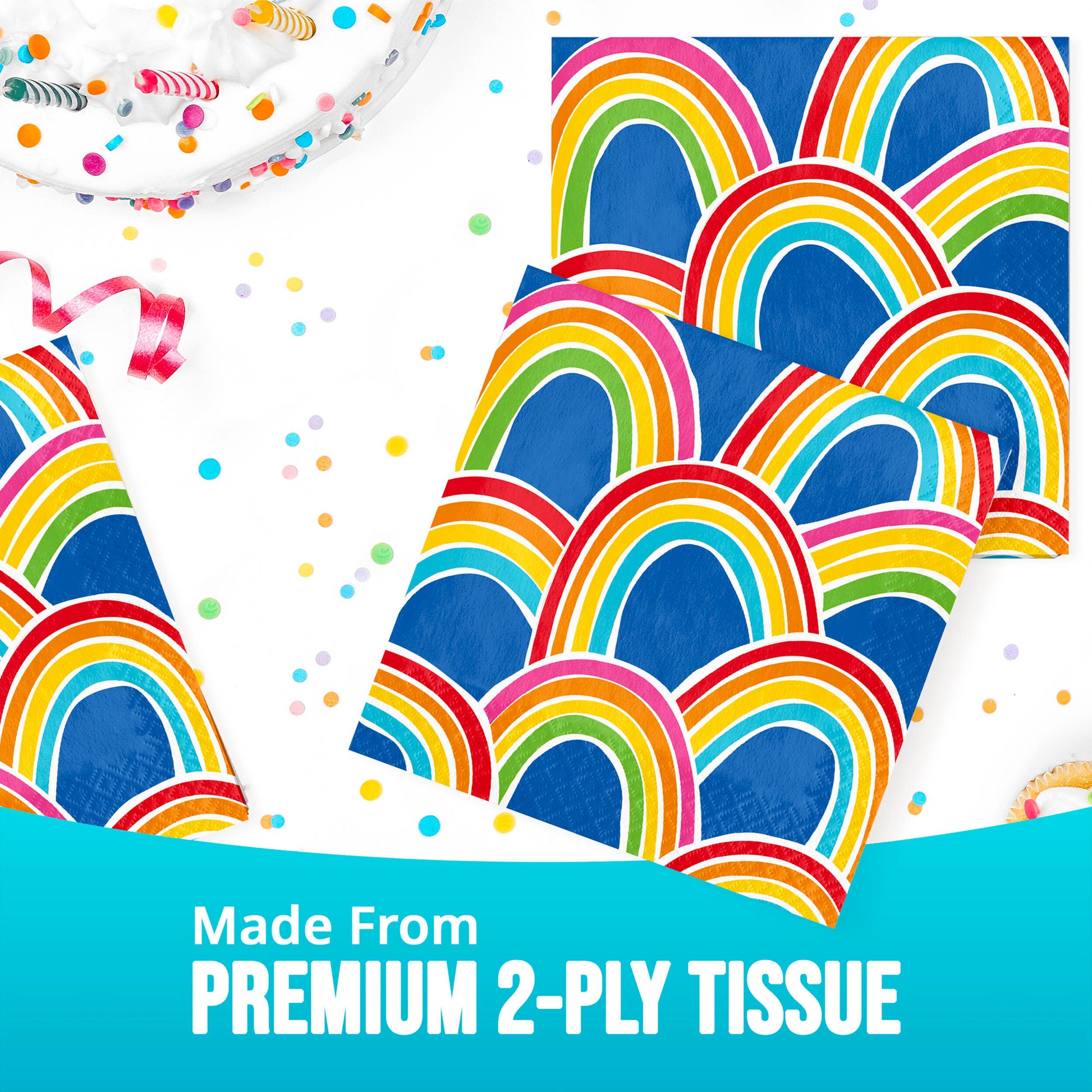 Rainbow-patterned tissue paper napkin on a white table with confetti and ribbons, labeled 'Made From Premium 2-Ply Tissue'.