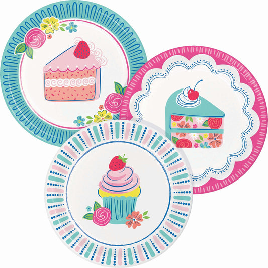 Set of three colorful paper plates with cake and cupcake designs on a white background