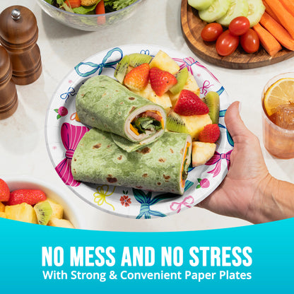 Paper plate with a wrap and fruit salad, surrounded by vegetables and a drink, with text 'No Mess and No Stress'.