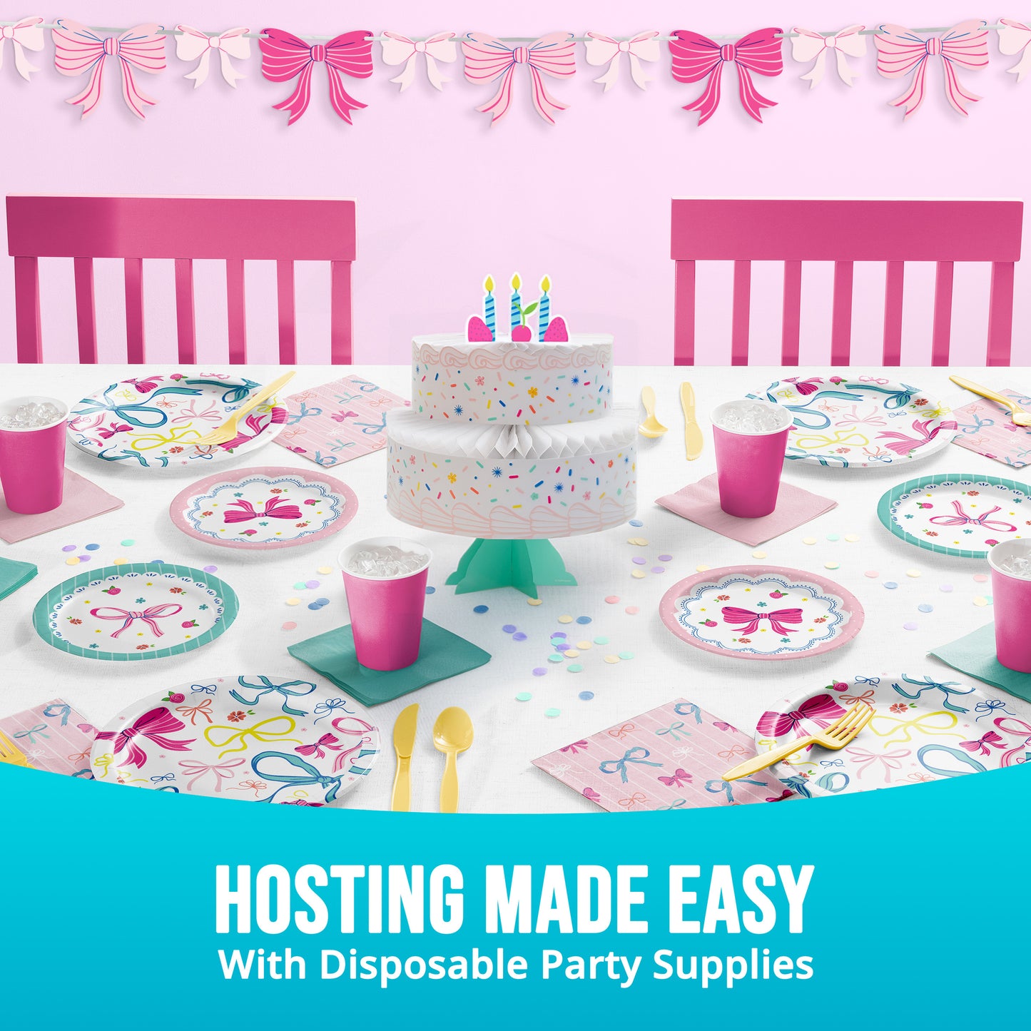 Disposable party supplies including a cake, plates, cups, and utensils on a table with pink chairs and decorative bows.