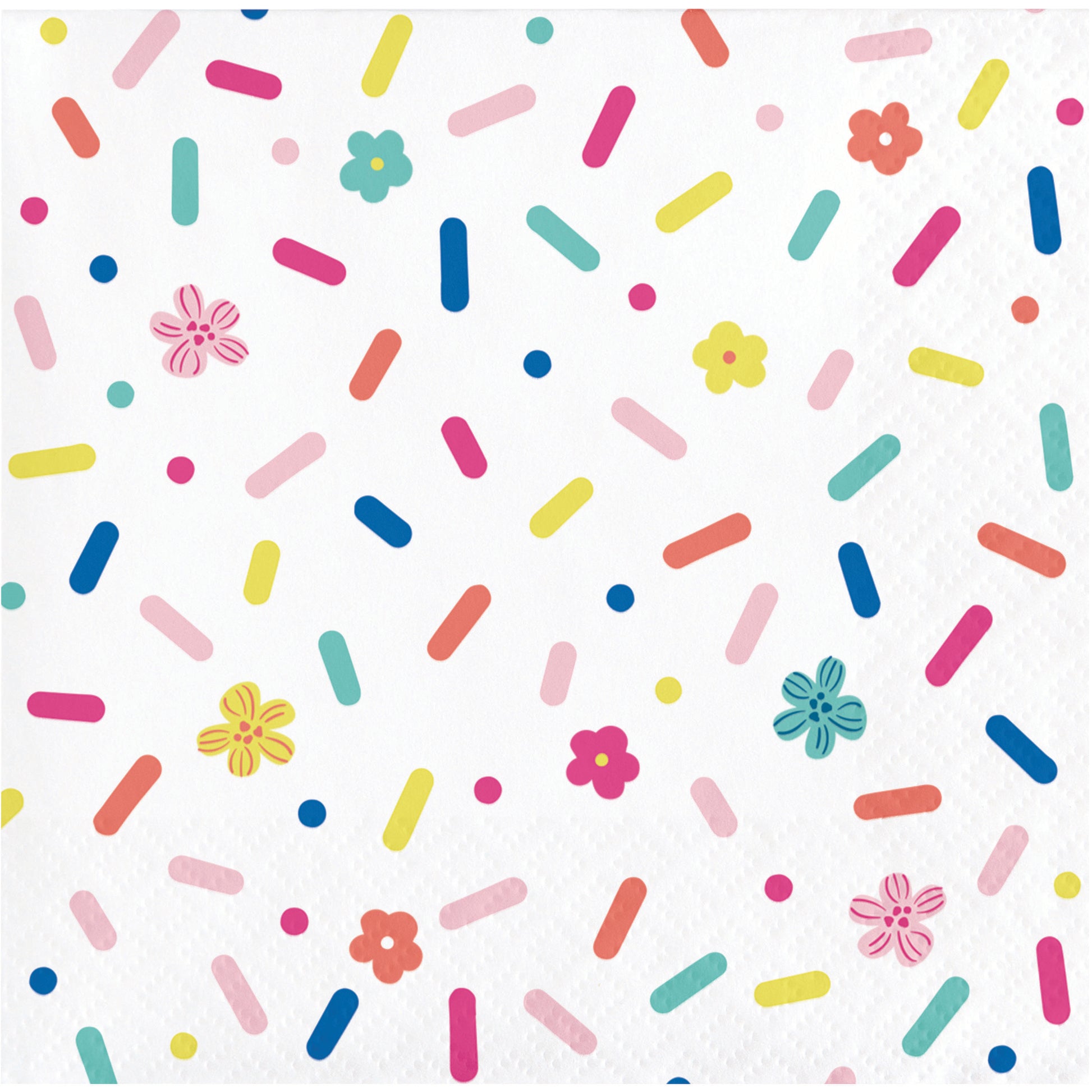 Napkin with colorful sprinkles and flowers on a white background