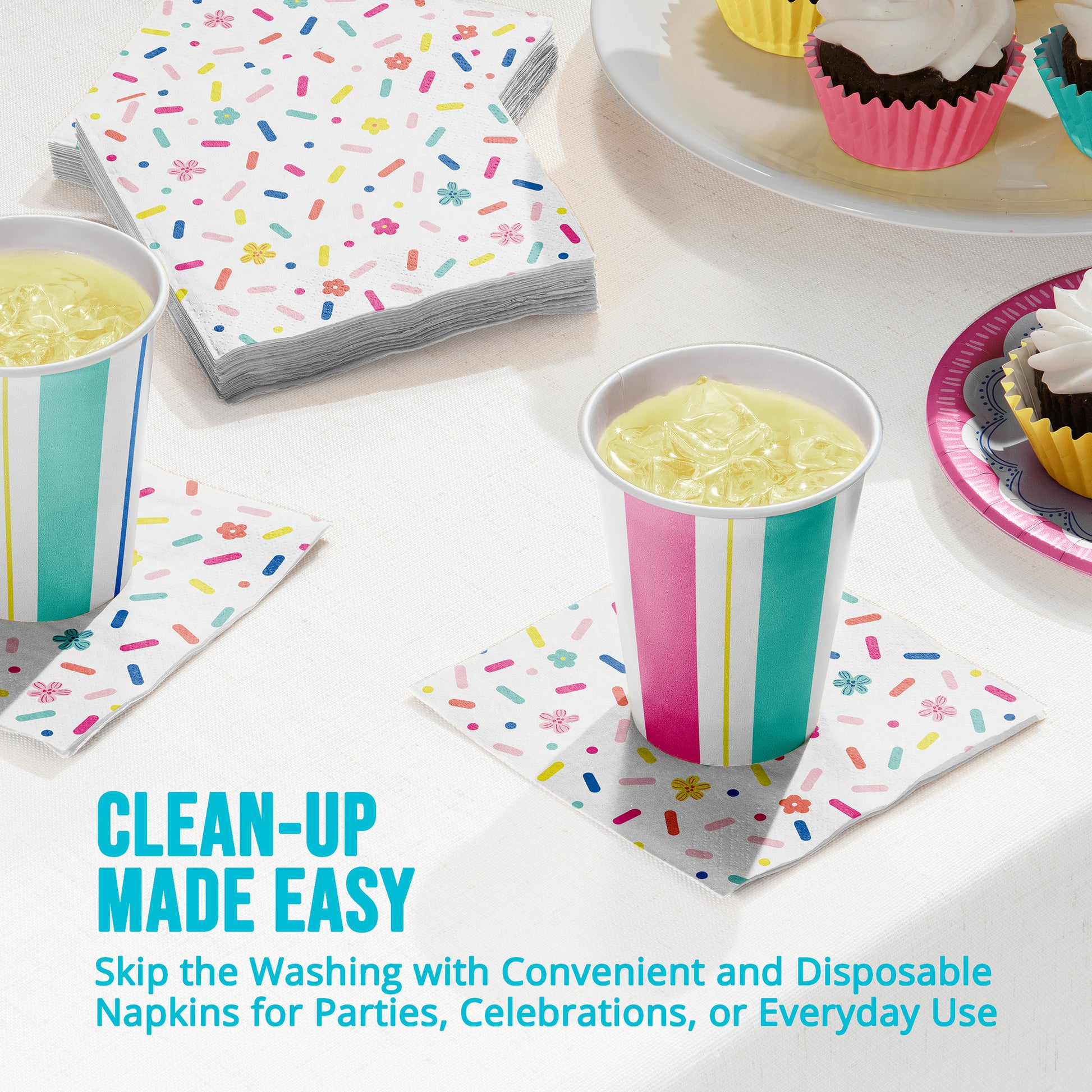 Disposable napkins with colorful designs on a table with drinks and cupcakes along with "Clean-Up Made Easy" text