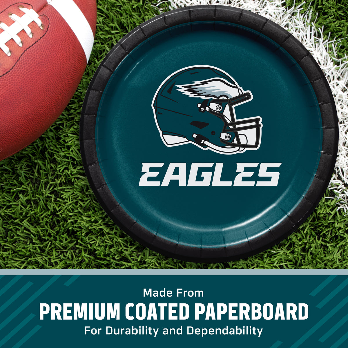 A Philadelphia Eagles themed paper plate on a green turf background with a football partially visible on the left. A text banner at the bottom reads 'Made From PREMIUM COATED PAPERBOARD For Durability and Dependability'.
