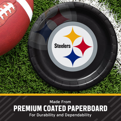 A Pittsburgh Steelers themed paper plate on a green turf background next to a football, with a text banner at the bottom reading 'Made From PREMIUM COATED PAPERBOARD'.