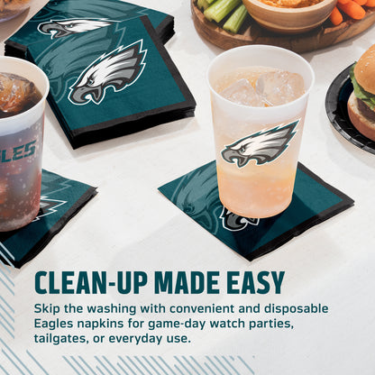 Philadelphia Eagles themed disposable napkins and cups on a game-day table setting, with promotional text at the bottom.