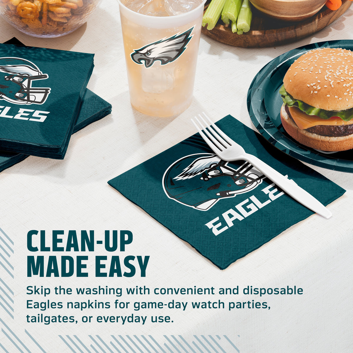 Philadelphia Eagles themed disposable napkins and a matching drink cup on a white table, styled with a burger, celery, and fries. Text on the image reads 'CLEAN-UP MADE EASY' and describes the Eagles napkins for game-day watch parties, tailgates, or everyday use.