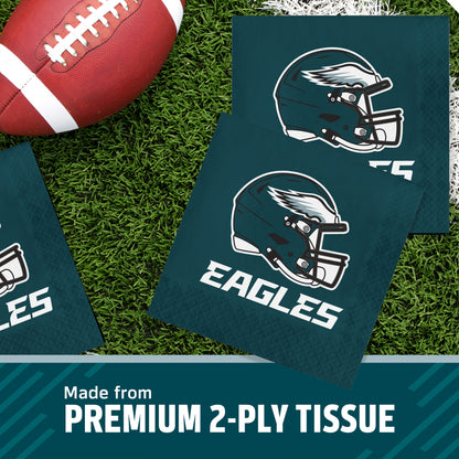 Philadelphia Eagles themed premium 2-ply tissue paper on a green turf background with a football prop, featuring the team helmet logo and 'EAGLES' text, with a banner at the bottom reading 'Made from PREMIUM 2-PLY TISSUE'.