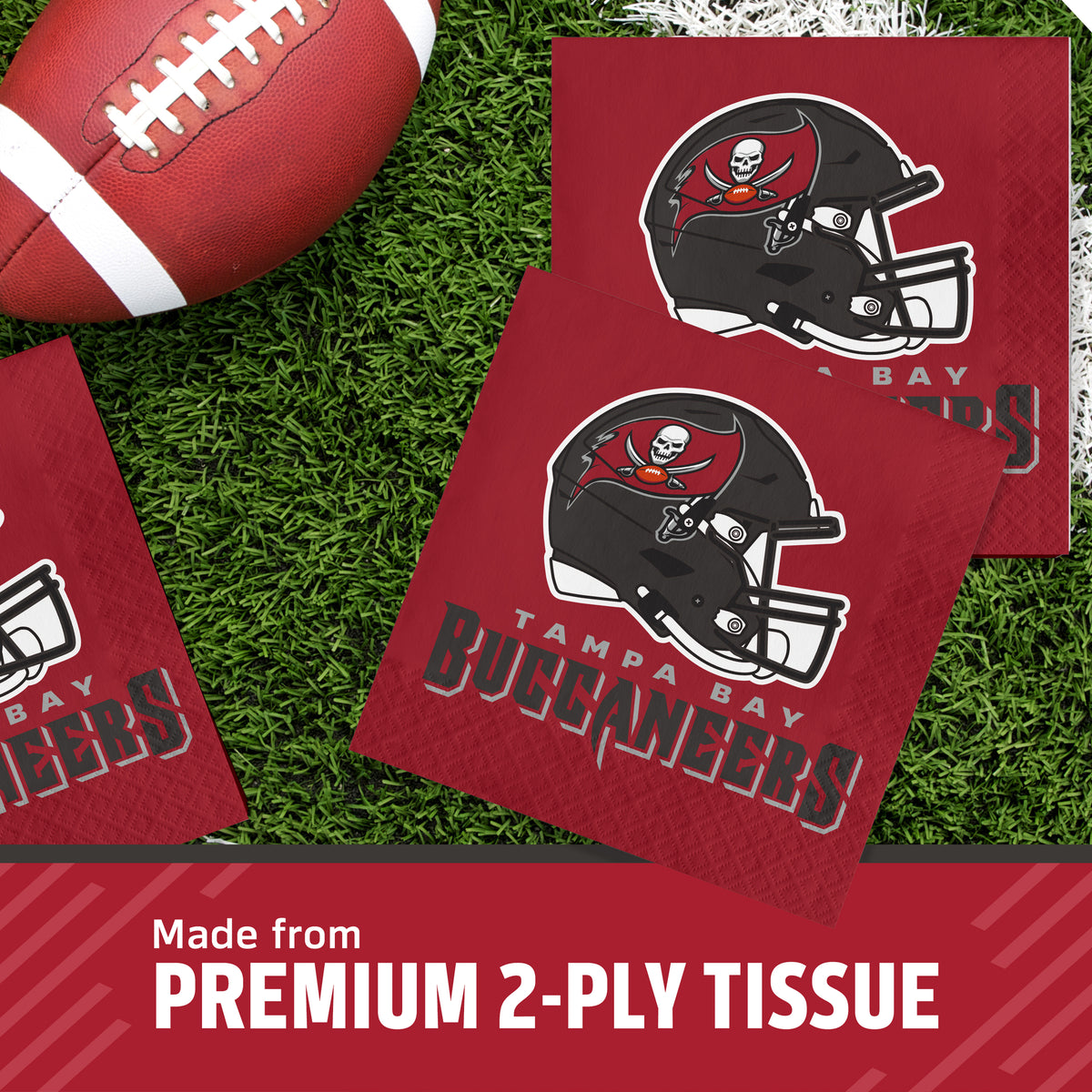 Tampa Bay Buccaneers themed 2-ply tissue paper napkins displayed on artificial turf with a football prop. The napkins feature the Buccaneers helmet logo and team name.