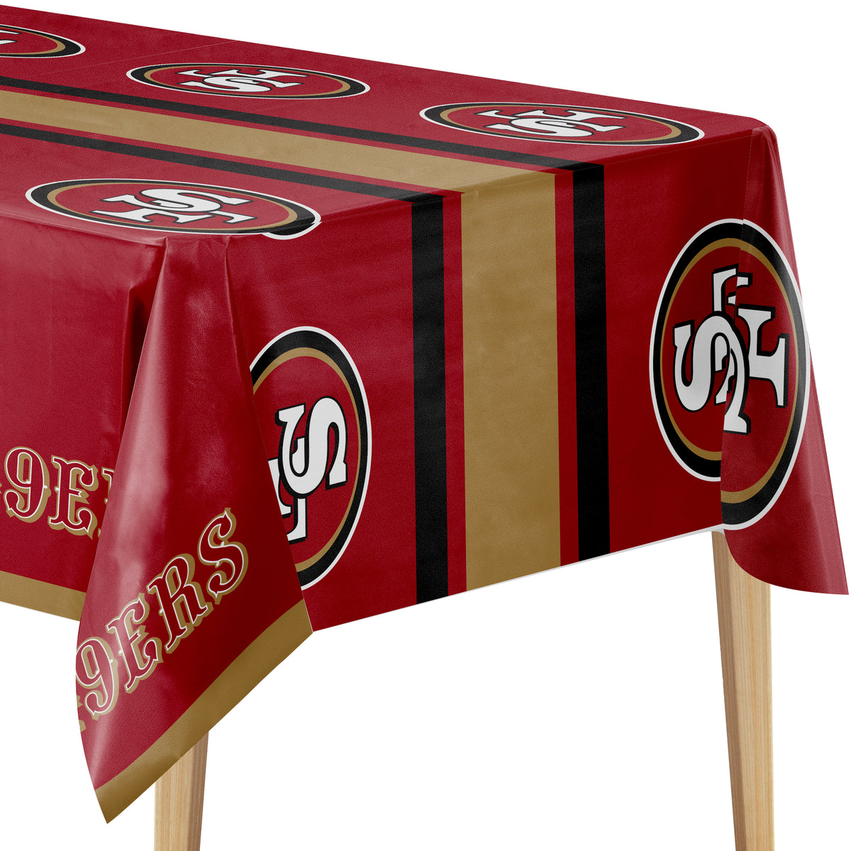A red tablecloth printed with the San Francisco 49ers logo and team name, draped over a table with wooden legs visible against a white background.