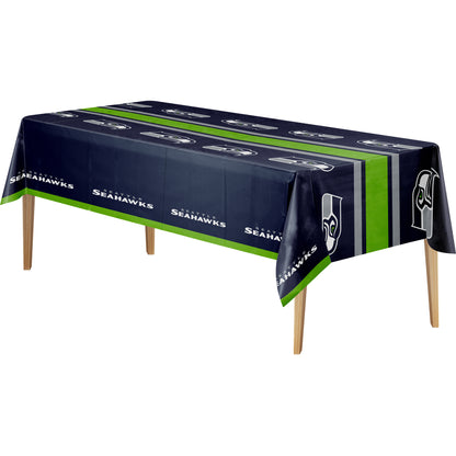 A rectangular table covered with a Seattle Seahawks themed tablecloth, shown on a plain white background. The tablecloth is navy blue with bright green stripes and white team logos and text.