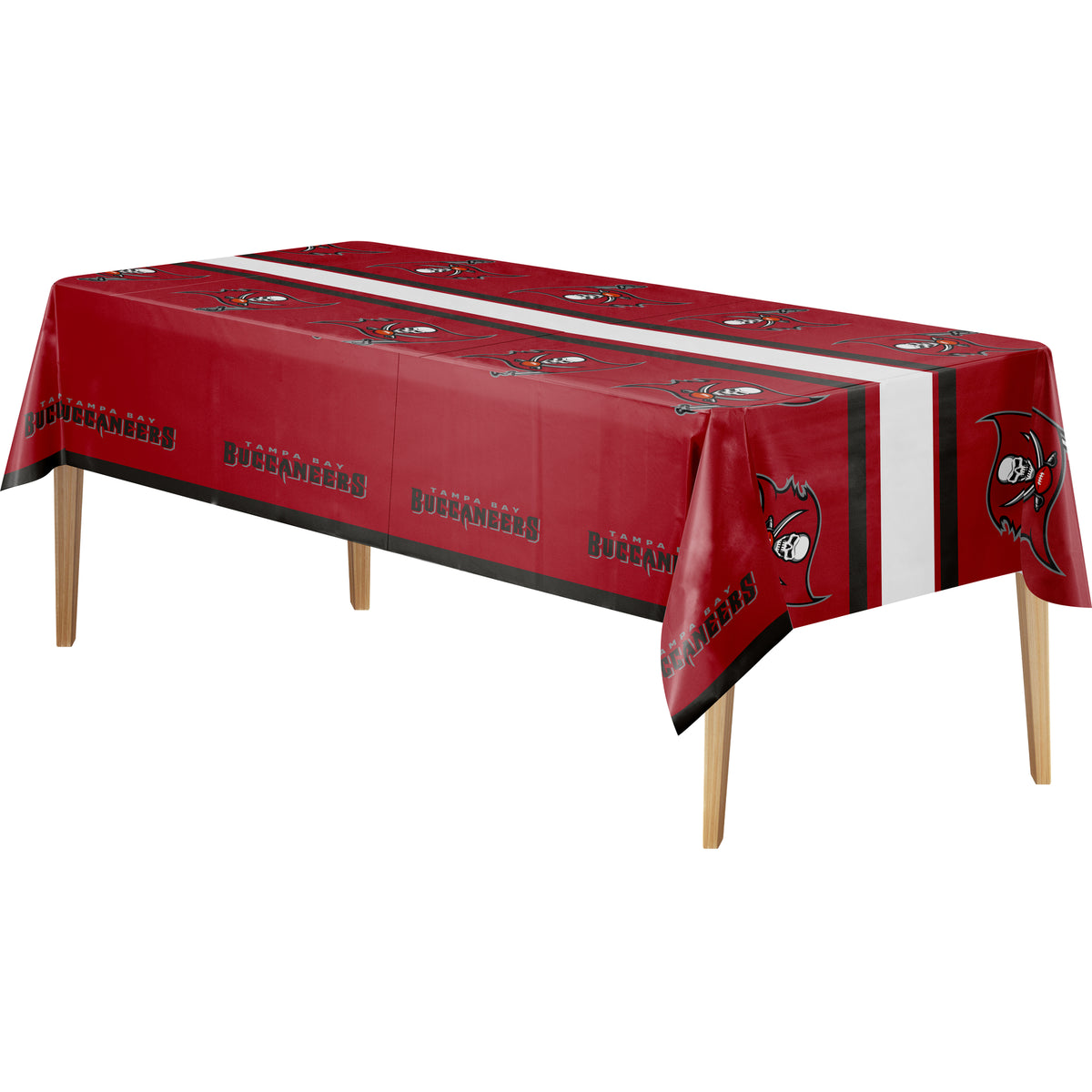 A rectangular table covered with a red tablecloth featuring repeated black, red, and white Buccaneers logos and text, plus a white vertical stripe down the center, shown on a plain white background.