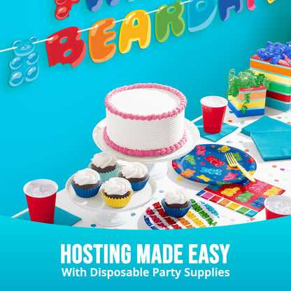 Birthday party setup with cake, cupcakes, and decorations against a blue background and "Hosting Made Easy" text