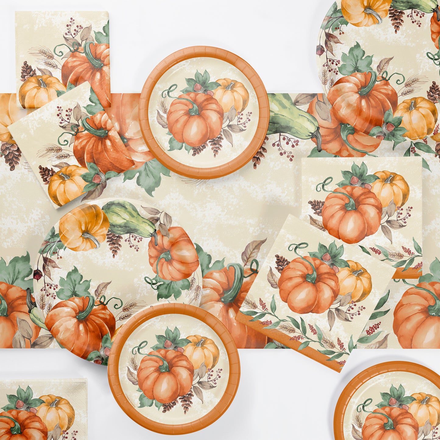 Harvest Delight Paper Tablecloths 12 ct. Table setting with pumpkin-themed plates, napkins, and tablecloth on a white background