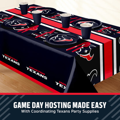 Houston Texans themed party table setting with a printed tablecloth, matching plates, cups, and utensils, shown on a table with a promotional banner at the bottom that says "Game Day Hosting Made Easy".